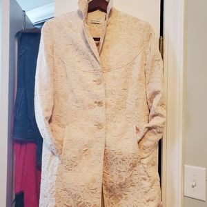 Beautiful gold tone coat.